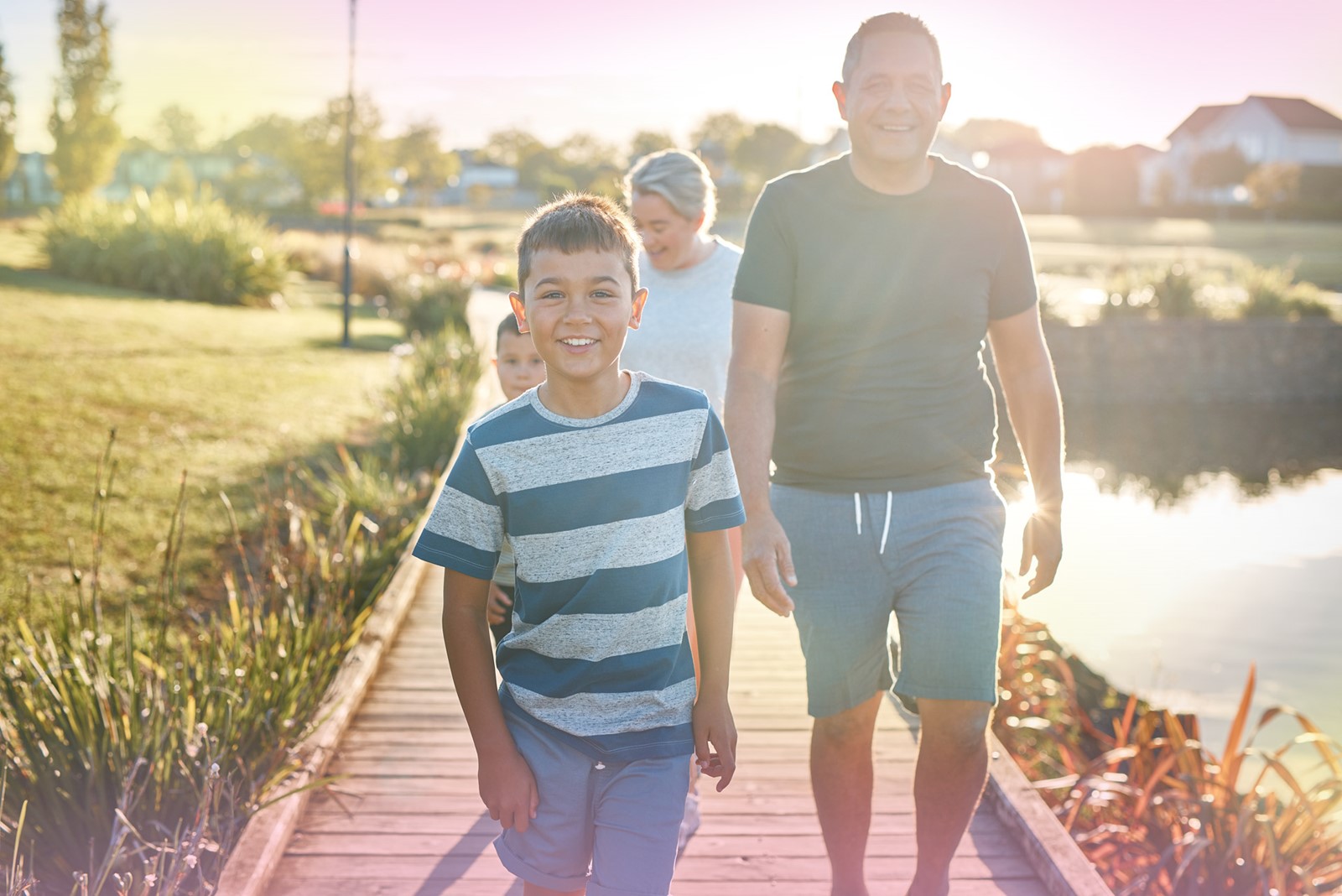 Family on boardwalk_web.png